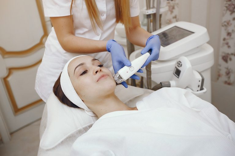 Woman in cosmetology studio on laser hair removal